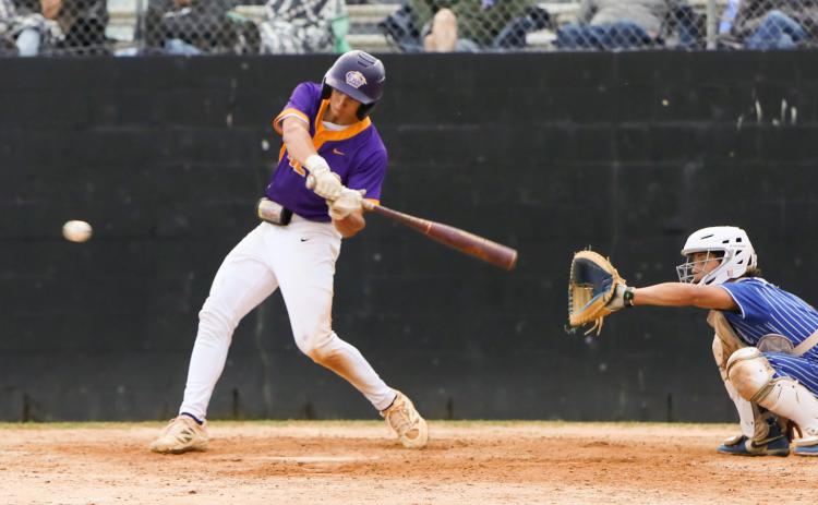 Columbia second baseman Madden Mann drives in a run against Keystone Heights on Monday. (BRENT KUYKENDALL/Lake City Reporter)
