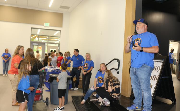 Roger Little (far right), Eastside principal, addresses the audience during the school’s open house event on Thursday. (TONY BRITT/Lake City Reporter)