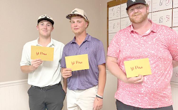 The winning team at the Branford Rotary Club’s annual golf tournament was Gavin Barnes (from left), Dylan Cannon and Jeffrey Barnes. (COURTESY)