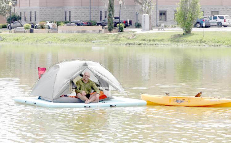 Michael McInally, a Lake City man who has an outdoors YouTube channel, is spending 24 hours floating on Lake DeSoto in downtown Lake City. (TONY BRITT/Lake City Reporter)