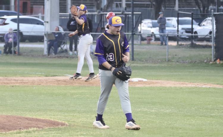 Columbia pitcher Kyler Keen celebrates as first baseman Nolan Slaymaker makes the catch at first base for the final out of the Tigers' 3-2 win over Santa Fe on Thursday. (JORDAN KROEGER/Lake City Reporter)