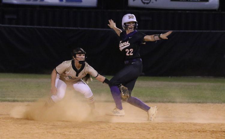 Columbia catcher Emily Delgado (22) signals she's safe at second base ahead of the tag from Buchholz second baseman Avery Fullam during Thursday's 4-2 win. (MORGAN MCMULLEN/Lake City Reporter)