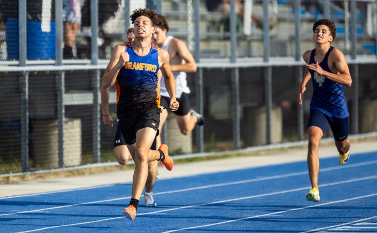 Branford's Blake Pilkington won the Region 2-1A title in the 400m on Friday. (JACK HOWDESHELL/Lake City Reporter)