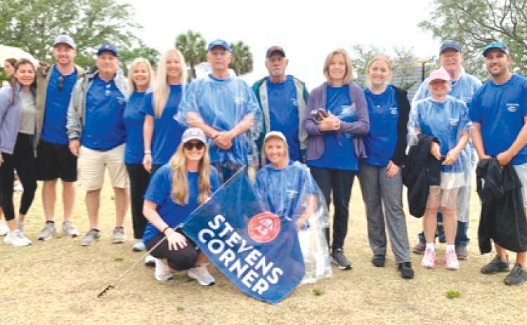 Members of the group Stevens Corner gather for a photo during the Walk to Defeat ALS Jacksonville on May 2 at The Friendship Fountain. The group consisted of 39 family members and friends of Don Stevens. (COURTESY)