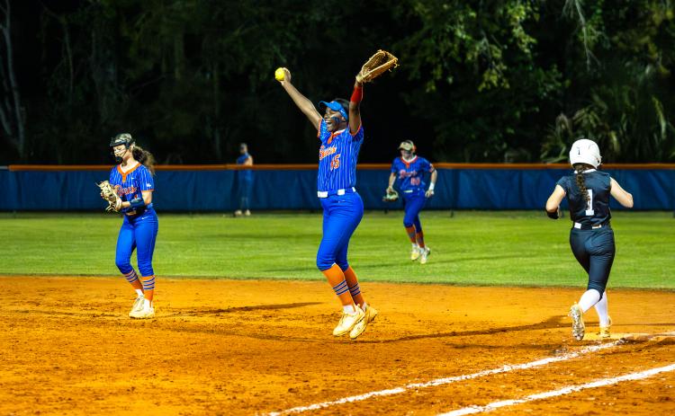 Branford first baseman Mallory Blue celebrates after making the final out that secured a 9-3 win over Union County in the Region 3-R semifinals on Thursday. (JACK HOWDESHELL/Lake City Reporter)