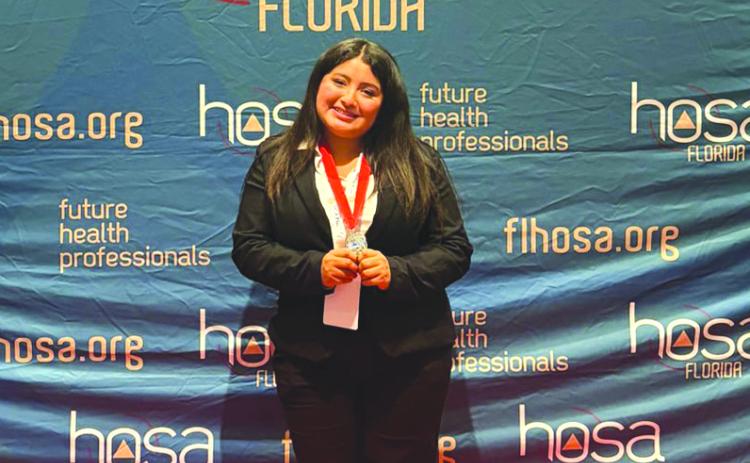 Florida Gateway College’s Elisabeth Garcia-Gijon finished second in the state HOSA conference to qualify for the international conference in pathophysiology. (COURTESY FLORIDA GATEWAY COLLEGE)