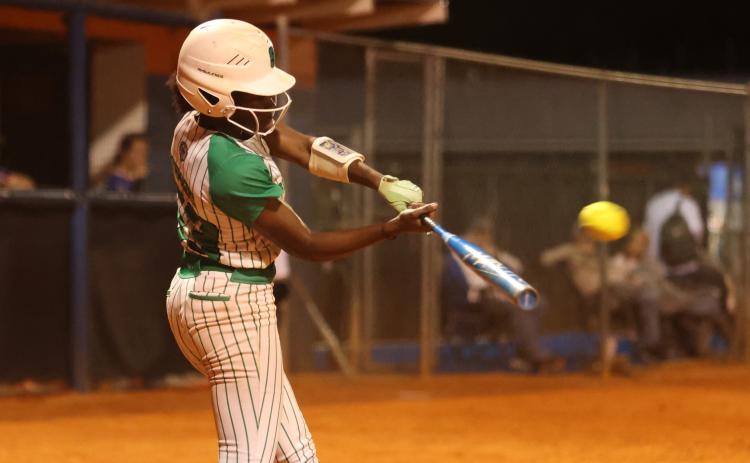 Suwannee outfielder Brianna Stephens-Woods swings at a pitch against Branford on March 19. (PAUL BUCHANAN/Lake City Reporter)