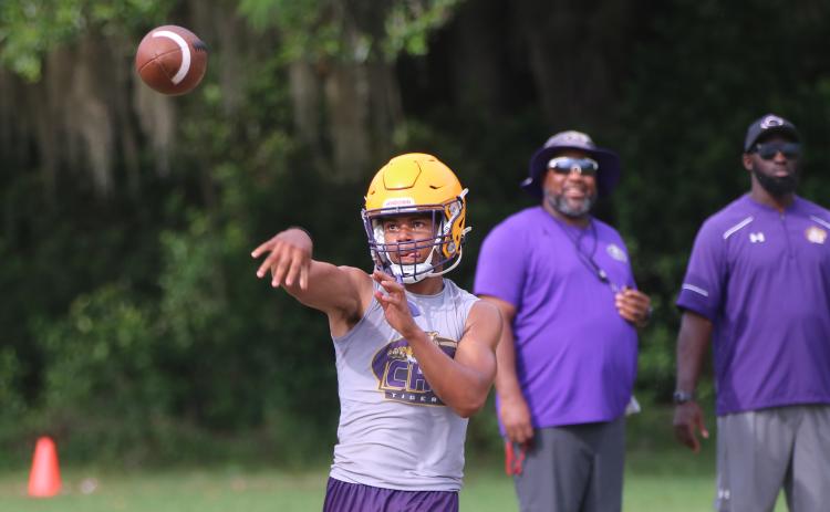 Columbia quarterback Kaleb Williams throws a pass during Monday’s practice. (JORDAN KROEGER/Lake City Reporter)