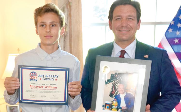 Fort White Middle School student Maverick Williams won a state essay contest on ‘Celebrating Florida’s Contributions to America’ for his entry on Dr. James Cade, the founder of Gatorade. Williams won a two-year scholarship as well as a picture of Cade from Gov. Ron DeSantis in the contest. (COURTESY)