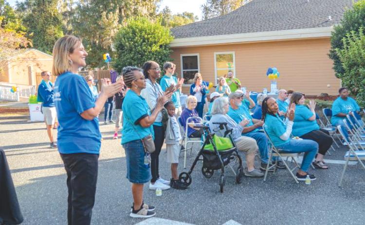 Supporters cheer during a previous year’s Walk a Mile in My Shoes fundraiser for Columbia County Senior Services at the Lifestyle Enrichment Center. (FILE)