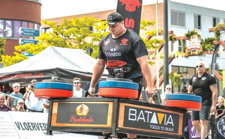 South African bodybuilder Rayno Nel performs a feat of strength during a Strongman Champions League event in Holland. The SCL is set to host an international event in Olustee Park on Oct. 10 after getting a sponsorship from the Columbia County TDC. (COURTESY)