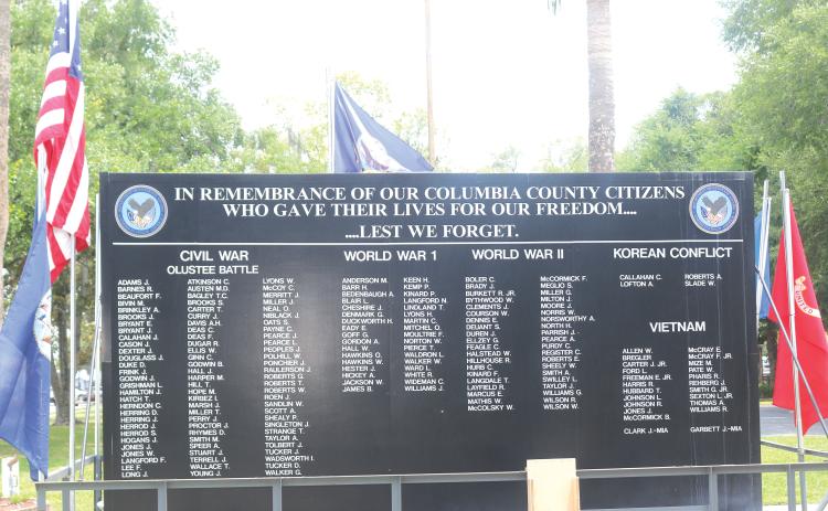 A memorial wall lists the names of Columbia County residents who lost their lives across different eras of American military history. The list sits outside the Lake City VA Medical Center, which will host a free, family friendly event on June 5. (TONY BRITT/Lake City Reporter)
