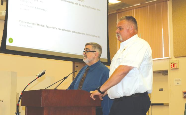 Columbia County Fire Rescue Assistant Chief Lance Hill (right) and County Manager David Kraus discussed the importance of EMS services in the county during the County Commission’s meeting on Thursday. (TONY BRITT/Lake City Reporter)
