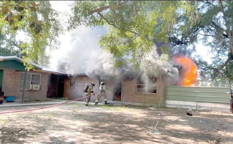 Lake City firefighters battle a blaze in a duplex on SE Brown Street on Wednesday. Nobody was injured in the fire although a dog perished. (COURTESY LAKE CITY FIRE DEPARTMENT)