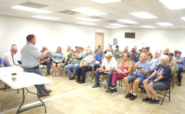 Columbia County Commissioner Tim Murphy (left) leads a discussion on Tuesday regarding a potential new community center in Columbia City. The meeting lasted roughly an hour and set up the next steps in the process. (MORGAN MCMULLEN/Lake City Reporter)