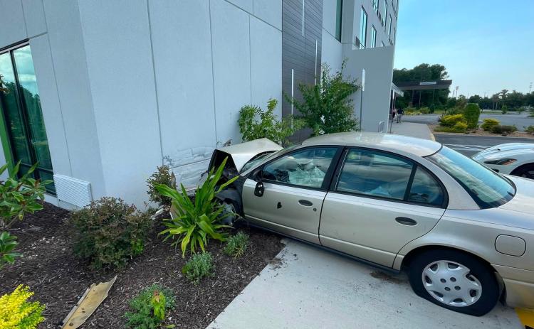 A car crashed into the Courtyard by Marriott hotel along U.S. Highway 90 on July 1. (COURTESY LAKE CITY FIRE DEPARTMENT)