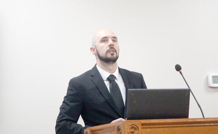 Caleb Perla, a partner with Powell and Jones, said Suwannee County is in ‘good shape’ financially with plenty of reserves. (JAMIE WACHTER/Lake City Reporter)