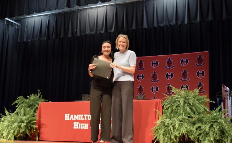 Hamilton County High’s Evelyn Cazarez receiveda North Florida College Presidential Scholarship, which covers full tuition and fees, from NFC President Jennifer Page. (COURTESY NORTH FLORIDA COLLEGE)