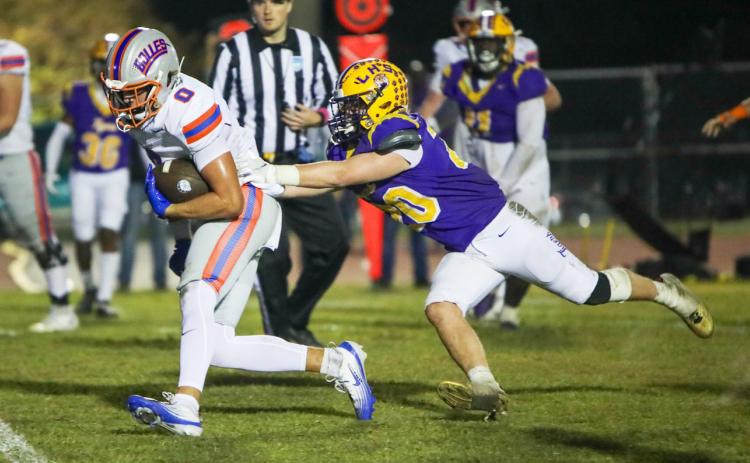 Columbia linebacker Bryson Grinstead tries to chase down Bolles running back Xander Edwards on Oct 31, 2025. (FILE)