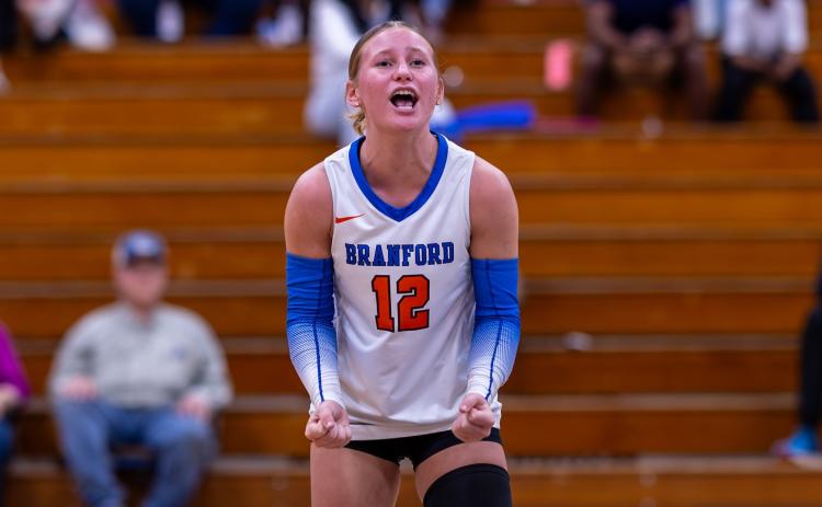 Branford libero Ava Alcorn celebrates after a point during last season's Class Rural Final Four. (JACK HOWDESHELL/Lake City Reporter)