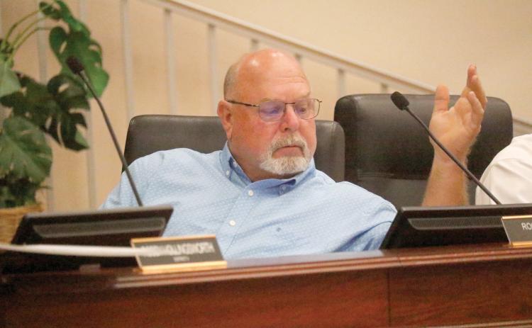 Columbia County Commissioner Rocky Ford said if the county wasn’t going to finish acquiring property to pave Mayo Road then it should give the property already acquired back to the residents. (JAMIE WACHTER/Lake City Reporter)