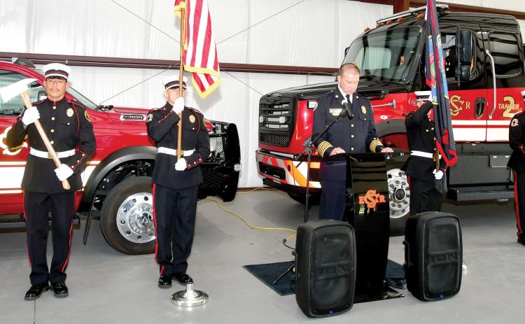 The Suwannee County Fire Rescue Honor Guard stand at attention as Fire Chief Dan Miller prepares to speak at the grand opening of Station 6 on Aug. 19. (ROB WOLFE/Lake City Reporter)