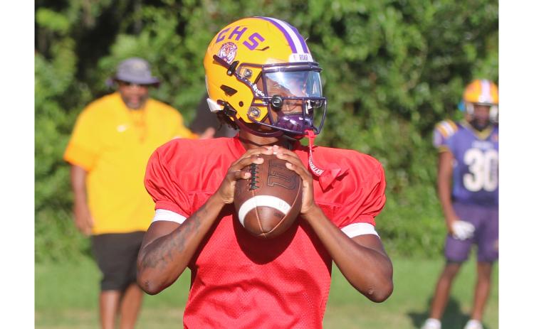 Columbia quarterback Amari Green drops back to pass during Tuesday’s practice. (JORDAN KROEGER/Lake City Reporter)