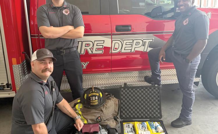 Lake City Fire Department driver/engineer and paramedic Chris Bethea (from left) and firefighters Jayden Britton-Drew and Nate Williams II are pictured with the department’s first Advanced Life Support engine. It went into service Saturday. (COURTESY)