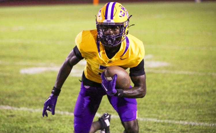 Columbia receiver Kyren Caldwell turns upfield after a catch against Riverside last Friday. (BRENT KUYKENDALL/Lake City Reporter)