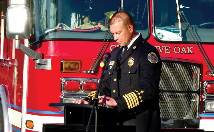 Suwannee County Fire Chief Dan Miller speaks at the Patriot Day ceremony Friday. Miller and his department are going to take over fire protection services in Branford following a vote of the town council last week. (ROB WOLFE/Lake City Reporter)