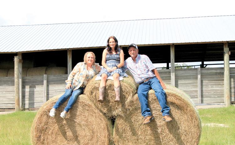 The Errol Buchanan family (Errol, Felecia, and Tanya) was named the Lafayette County Farm Family of the Year by the Lafayette County Farm Bureau. (COURTESY)