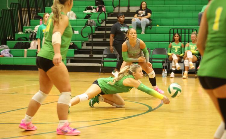Suwannee DS Makenzie Taylor dives to defend a shot against Lafayette on Sept. 1. (PAUL BUCHANAN/Lake City Reporter)