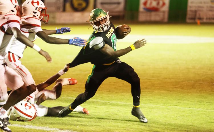 Suwannee running back Travon Fead tries to escape a tackle from Hamilton County last Friday. (PAUL BUCHANAN/Lake City Reporter)