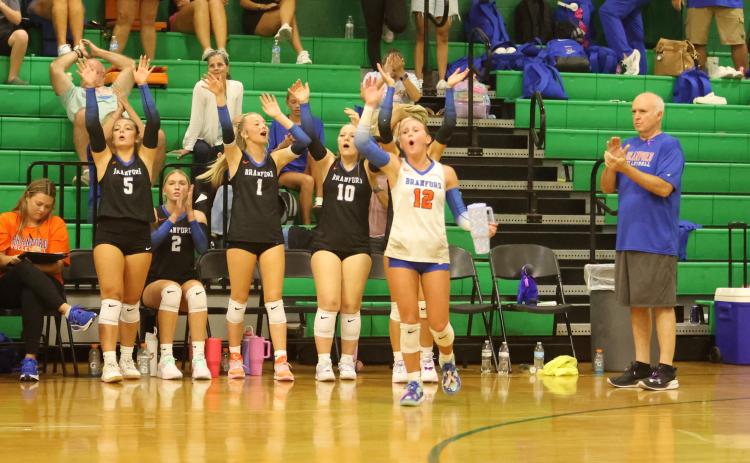 Branford's bench celebrates a point against Suwannee on Aug. 18. (PAUL BUCHANAN/Lake City Reporter)