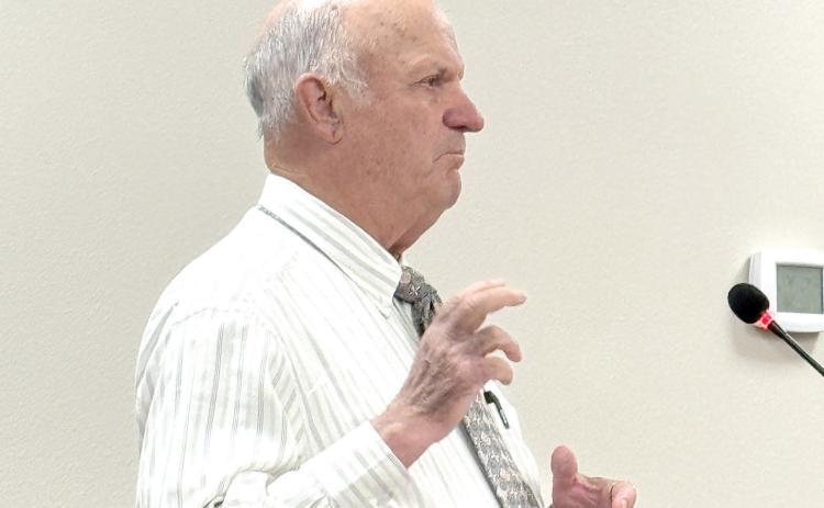 Richard Powell, who consults the North Florida Water Utilities Authority on financials, said the group could readdress the budget after three months to see what impact the rate changes have on the revenue. (JAMIE WACHTER/Lake City Reporter)