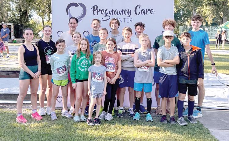 A group of participants in the Pregnancy Care Center’s Walk/Run 4 Life in Live Oak pose for a photo following the run. (COURTESY)