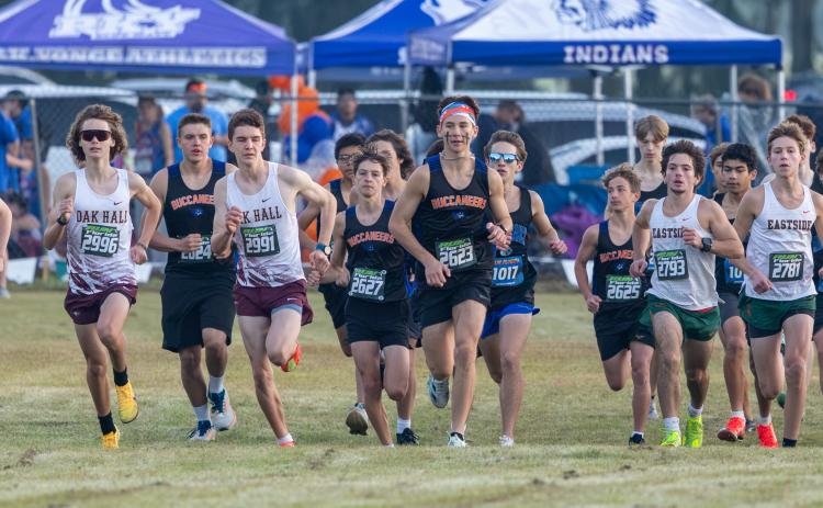 Branford's Logan Haley (2623) leads his teammates and the field at the start of the Run Florida Invitational on Saturday. (JACK HOWDESHELL/Lake City Reporter)