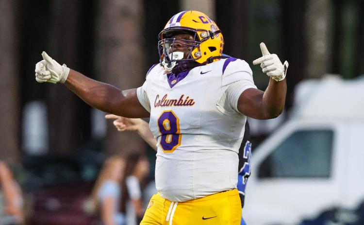 Columbia defensive tackle Jaylen Underwood celebrates after making a play against Trinity Christian on Friday. (GARY LLOYD MCCULLOUGH/Lake City Reporter)