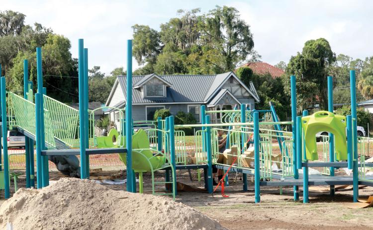 New playground equipment is being installed at Youngs Park as part of a complete park makeover. (TONY BRITT/Lake City Reporter)
