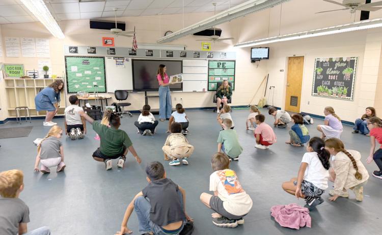 Columbia City Elementary students participate in the September Choose to Move lesson as County Extension introduces healthy habits through an interactive story and movement activities. Students put learning into action by exploring different ways their bodies can move. (COURTESY COLUMBIA COUNTY EXTENSION)