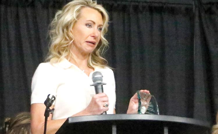 Ashleigh Pitzer, the founder of the Will Carpenter AYA Cancer Foundation, is emotional after the non-profit foundation started in her late son’s honor was named the Suwannee County Chamber of Commerce Non-Profit of the Year. (JAMIE WACHTER/Lake City Reporter)