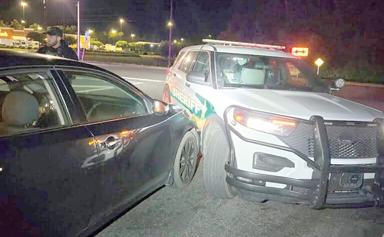 A Columbia County Sheriff’s Office vehicle was hit after, according to a Florida Highway Patrol release, a 26-year-old Lake Butler man was woken up after falling asleep at the wheel of his car. (COURTESY)