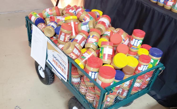 The Columbia County Extension has launched its annual Peanut Butter Challenge, a community-wide collection drive to benefit families in need. It runs through Nov. 20. (COURTESY COLUMBIA COUNTY EXTENSION)