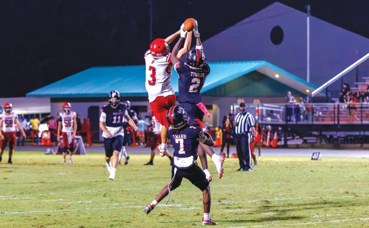 Fort White safety Marvion Wallace (2) picks off a pass intended for Lafayette’s Lane O’Steen before returning it for a touchdown Friday. (JACK HOWDESHELL/Lake City Reporter)