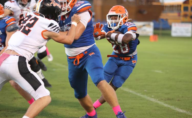 Branford running back Cameron Anderson looks for running room against Trenton on Monday. (PAUL BUCHANAN/Lake City Reporter)