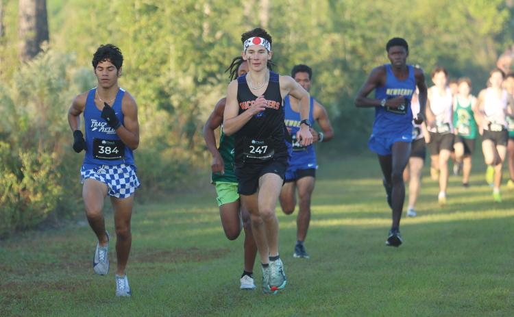 Suwannee runners Logan Haley races to his runner-up finish at the Suwannee Invitational on Saturday. (PAUL BUCHANAN/Lake City Reporter)