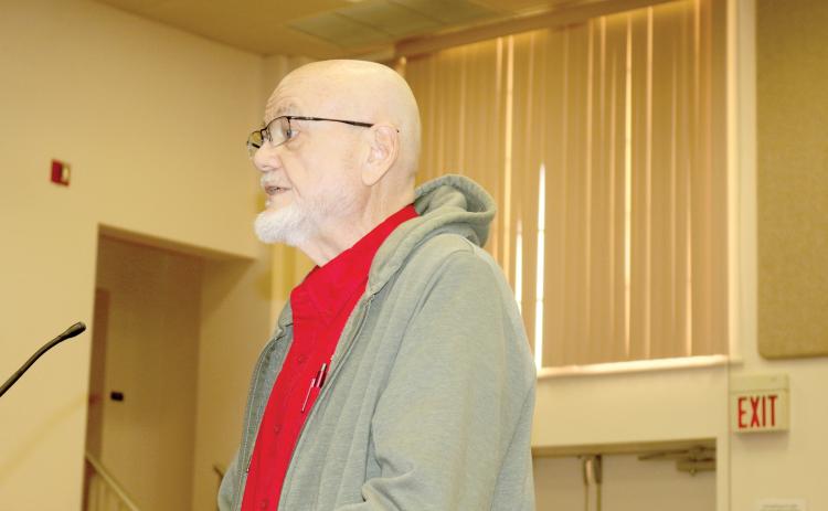 Mickey Garrett, reading a prepared statement for the Columbia Teachers Association, requested the Columbia County School District increase transparency when it comes to employees’ take home pay. (TONY BRITT/Lake City Reporter)