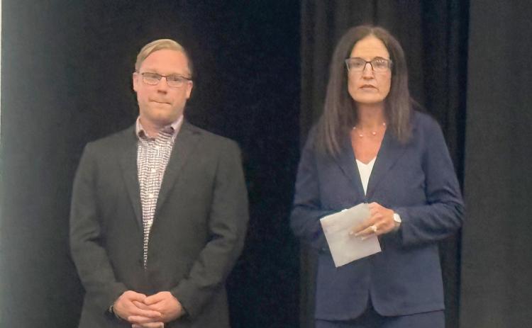 Suwannee County School District Community Relations Specialist TJ Vickers and Chief Financial Officer Marsha Brown speak about the proposed half-cent sales tax Monday at Suwannee High. (JAMIE WACHTER/Lake City Reporter)