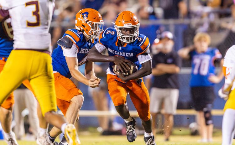 Buccaneers running back Ollie James score multiple touchdowns in Friday's 42-20 win over St. Joseph Academy. (FILE)