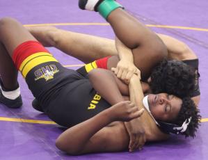 Columbia’s TK Acosta wrestles against Chiles during Friday’s District 2-2A Duals. (TONY BRITT/Lake City Reporter)